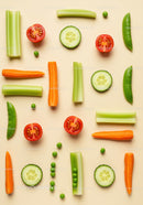 Fresh colorful vegetables arranged in neat grid layout