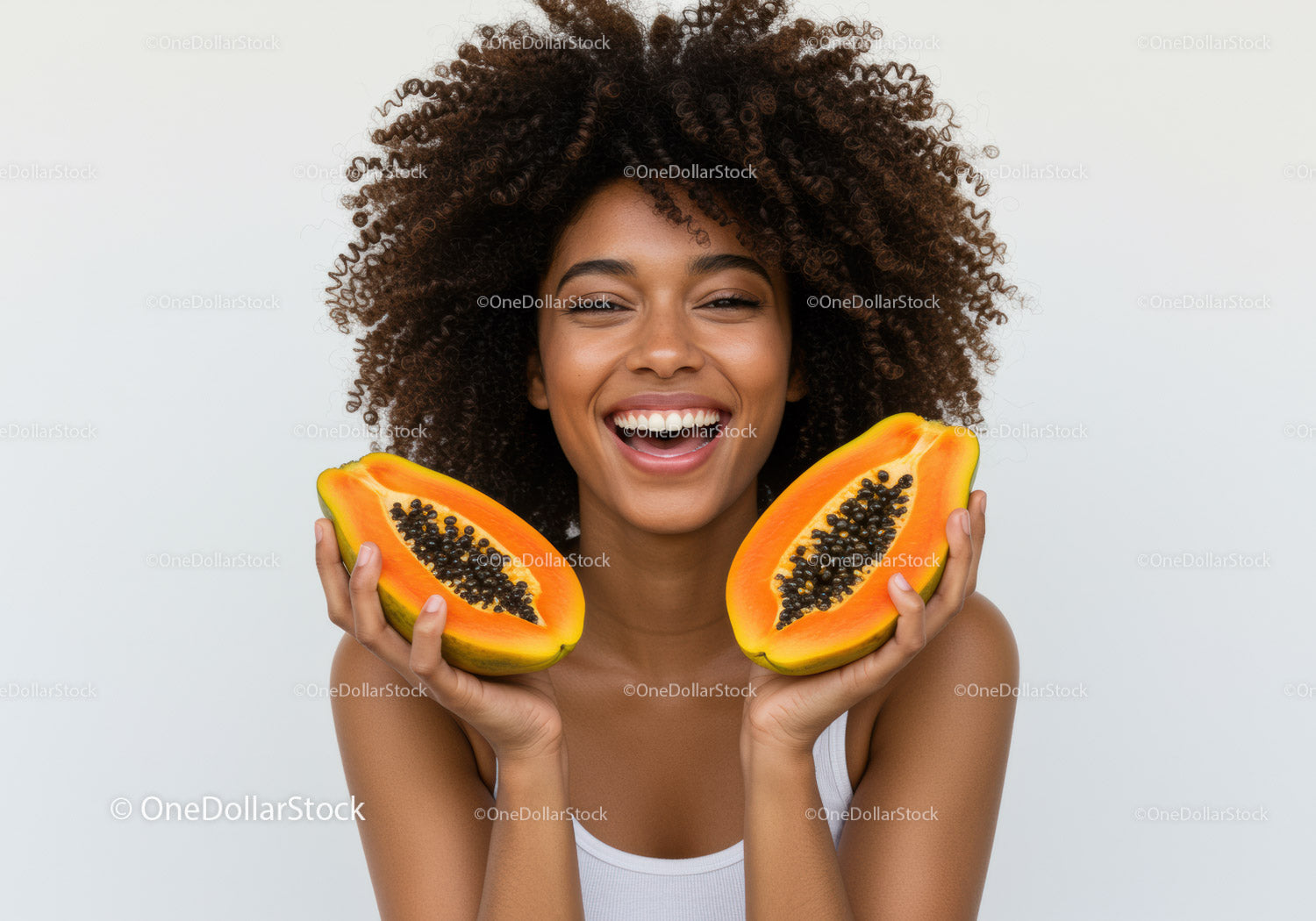 Vibrant Woman Smiling with Fresh Papaya Halves for Healthy Lifestyle