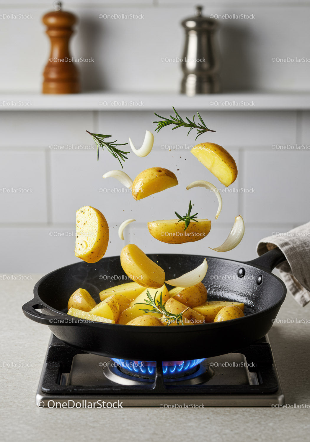 Golden Potatoes and Herbs Tossed in Hot Skillet