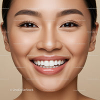 Close-up of cheerful woman with radiant smile