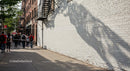 Urban Street Scene with Pedestrians and City Architecture