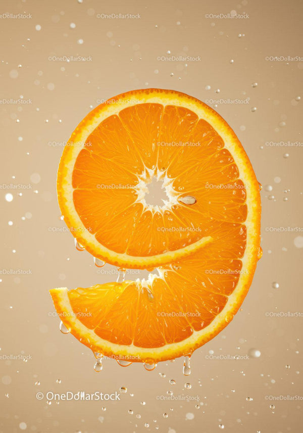 Fresh orange slice with glistening water droplets