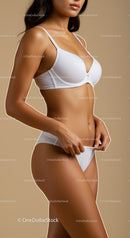 Elegant White Lingerie Model with Sensual Pose in Studio