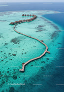 Overwater Bungalows on Turquoise Ocean with Wooden Pier