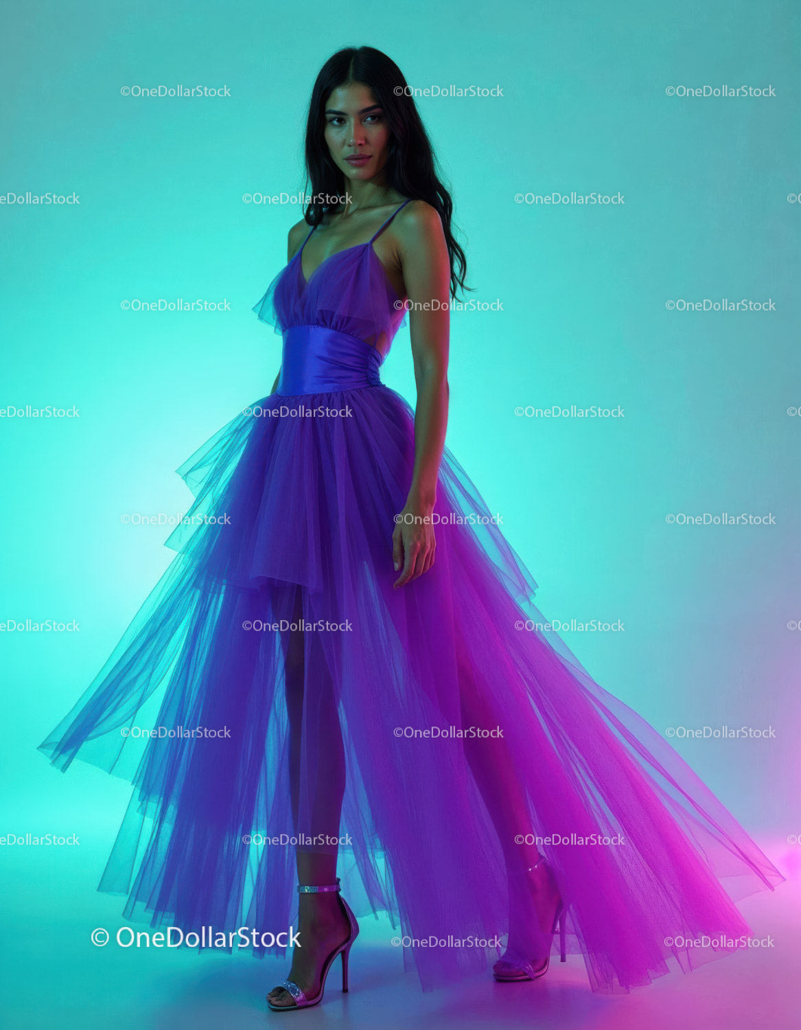 Elegant Woman in Flowing Purple Tulle Dress Studio Fashion Shot