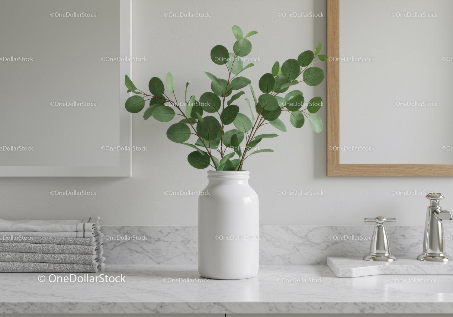 Elegant Eucalyptus Plant in White Ceramic Vase on Marble Bathroom Counter