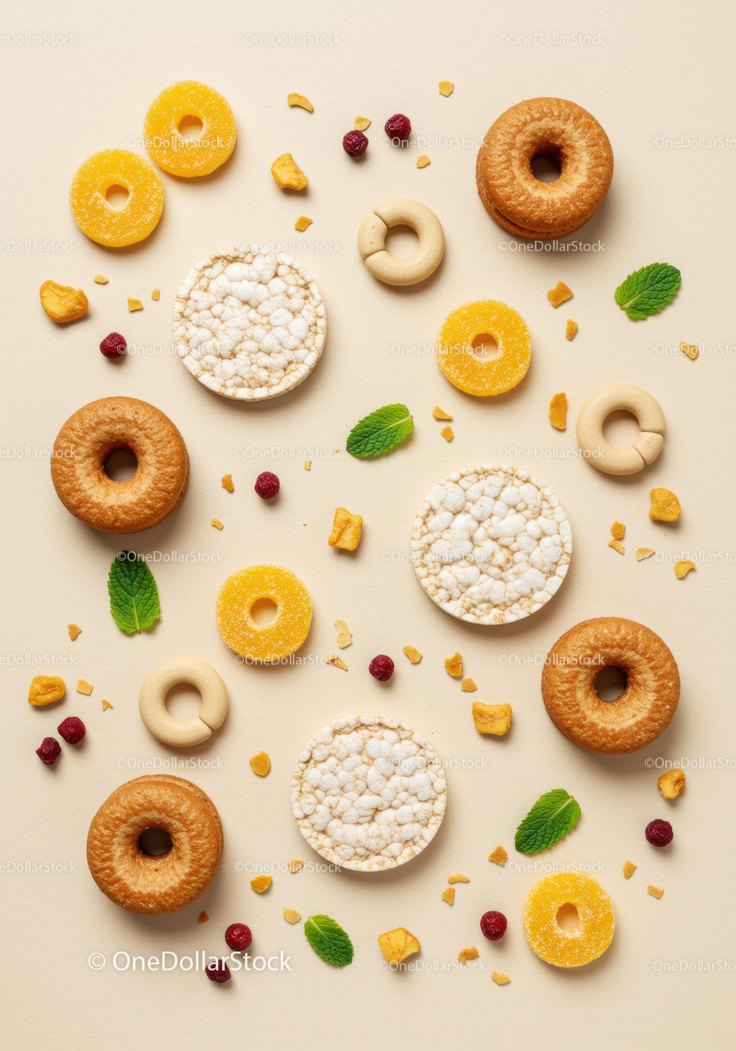Assorted healthy snacks with fruit and mint leaves