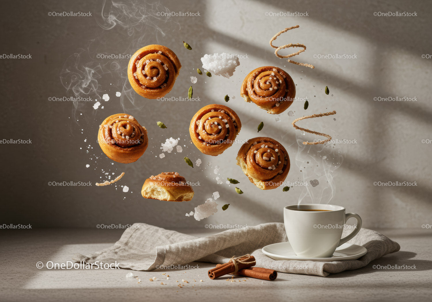Floating Cinnamon Rolls with Coffee and Spices on Cloth