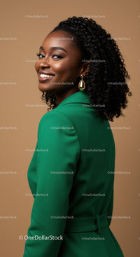 Elegant African American Woman in Green Blazer Wearing Gold Earrings