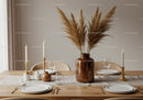 Elegant Dining Table Decor with Pampas Grass and Candles for Cozy Atmosphere