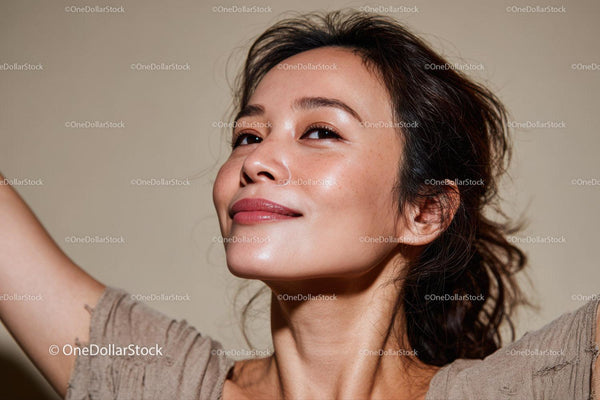 Portrait of a Smiling Woman with Radiant Skin and Joyful Expression