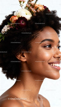 Smiling woman with natural hair and floral crown