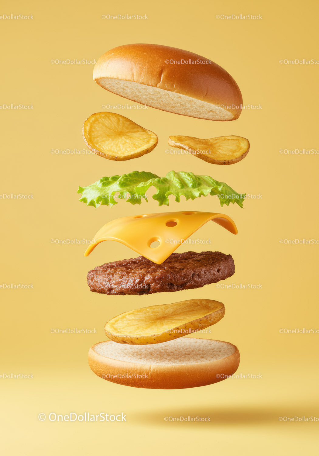 Deconstructed cheeseburger with potato slices and lettuce