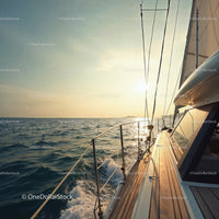 Sailing Yacht on Ocean at Sunset with Wooden Deck and Calm Waves