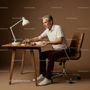 Senior Man Concentrating While Writing in Modern Workspace