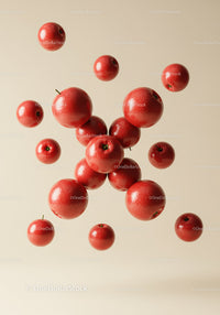 Floating Red Apples Against Soft Beige Background