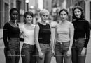 Group of diverse women standing confidently outdoors