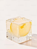 Close-up of Ice Cube with Lemon Slice Inside