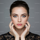 Close-up Portrait of a Young Woman with Blue Eyes and Flawless Skin