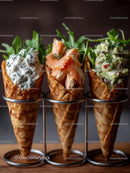 Variety of Gourmet Ice Cream Cones with Toppings on Waffle Cones