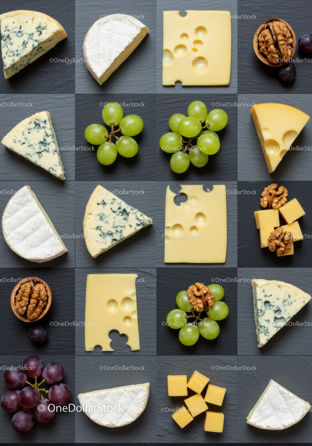 Variety of cheeses with fruits and nuts on slate board