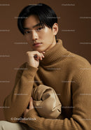 Elegant Male Portrait in Trendy Sweater with Brown Background