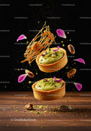 Artistic pistachio tarts with caramel and flower petals