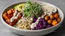 Colorful Vegan Buddha Bowl with Quinoa Chickpeas and Greens