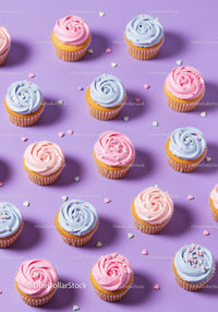 Colorful cupcakes with pastel frosting on purple background