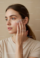 Close-Up of Woman Applying Face Cream for Skincare Routine