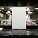 Blank menu board in sushi restaurant kitchen setting