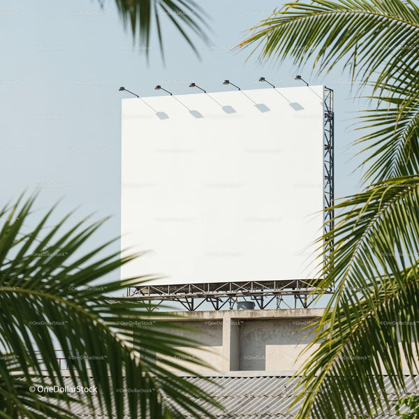 Blank Outdoor Billboard Surrounded by Tropical Palm Trees JPG Mockup Image
