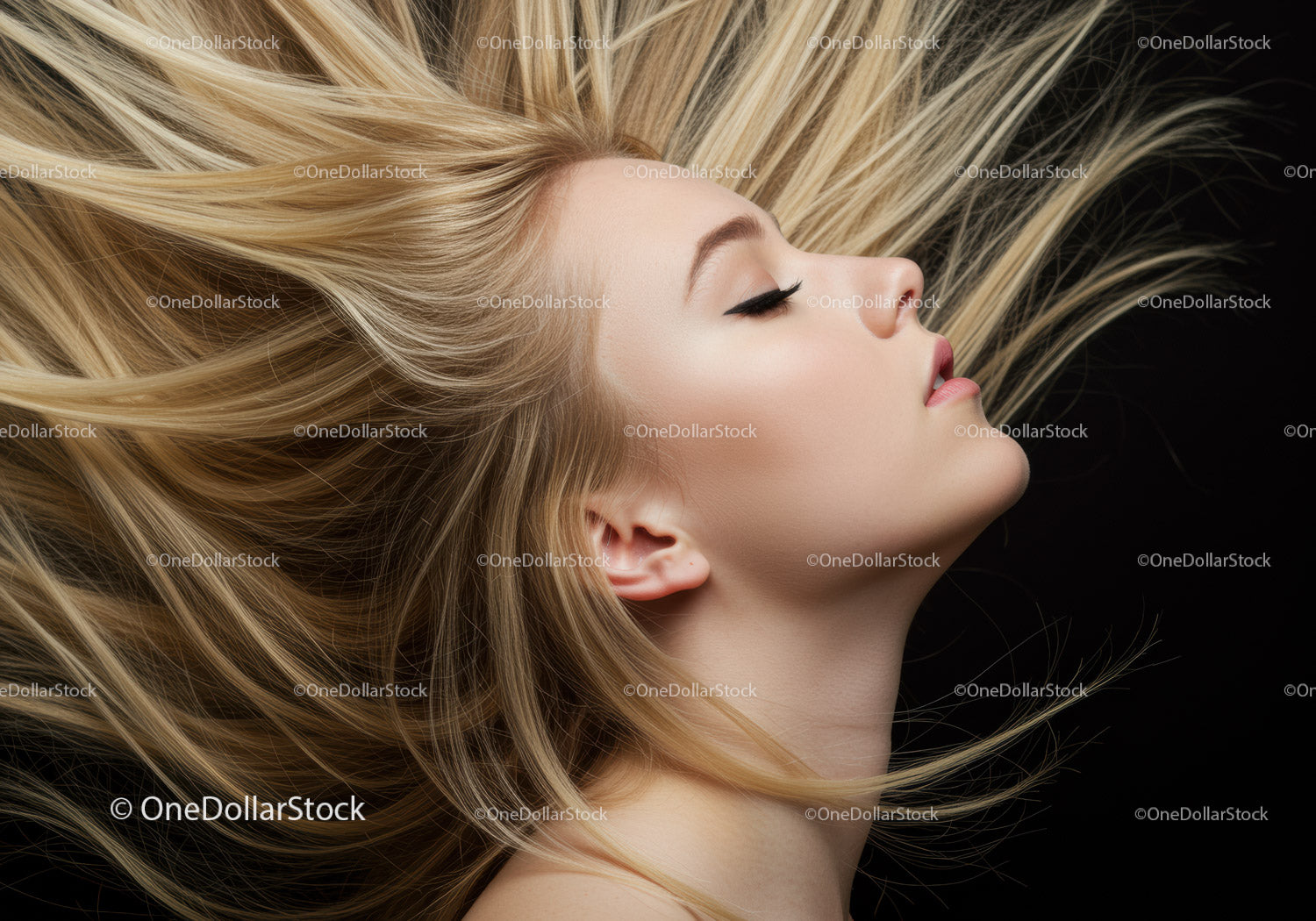 Blonde woman with flowing hair on black background