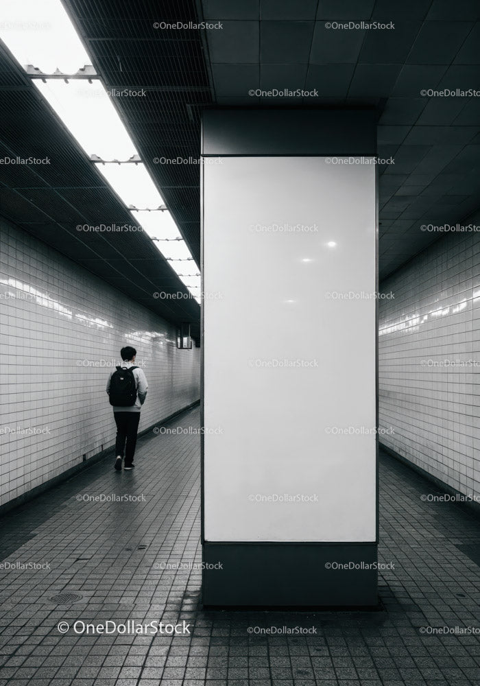 Minimalist Subway Tunnel with Tiled Walls and Modern Lighting