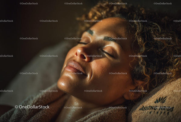 Close-up of Relaxing Woman with Glowing Skin and Serene Expression