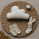 Cozy baby essentials with knitted bunny and cloud pillow