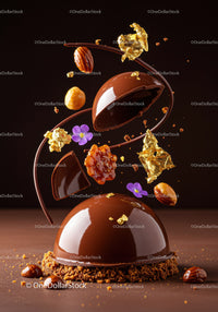 Elegant Chocolate Dome Dessert with Nuts and Gold Leaf