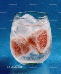 Ice Water with Grapefruit Slices in Clear Glass for Refreshing Summer Drink