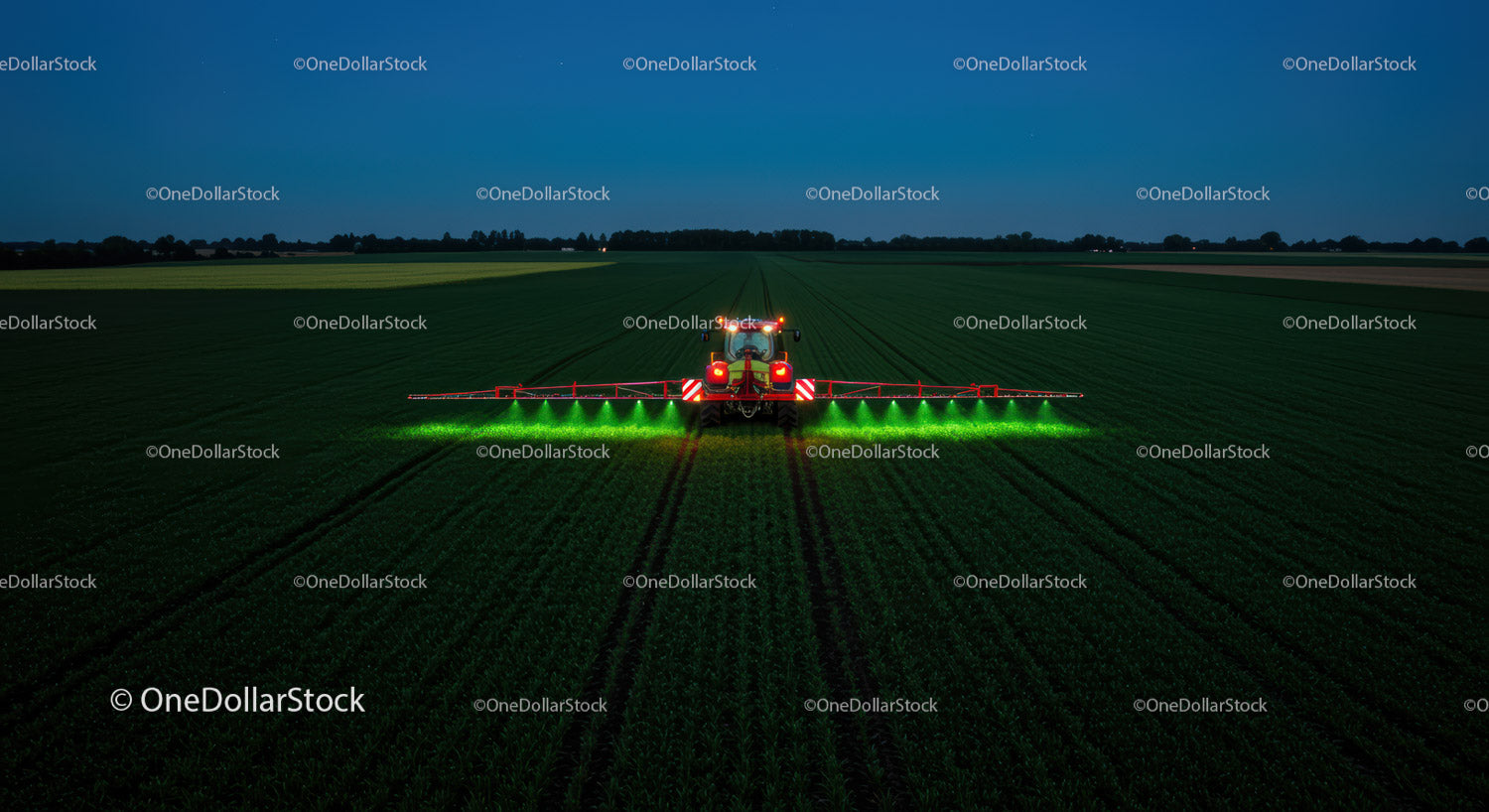 Nighttime Agricultural Spraying in Bright Green Light