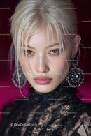 Elegant Young Woman with Platinum Blonde Hair and Lace Top