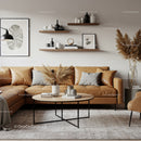 Cozy modern living room with tan leather sectional sofa