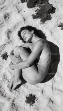 Serene woman embracing peace on textured sandy surface