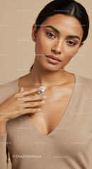 Young Woman Applying Facial Moisturizer for Healthy Glowing Skin