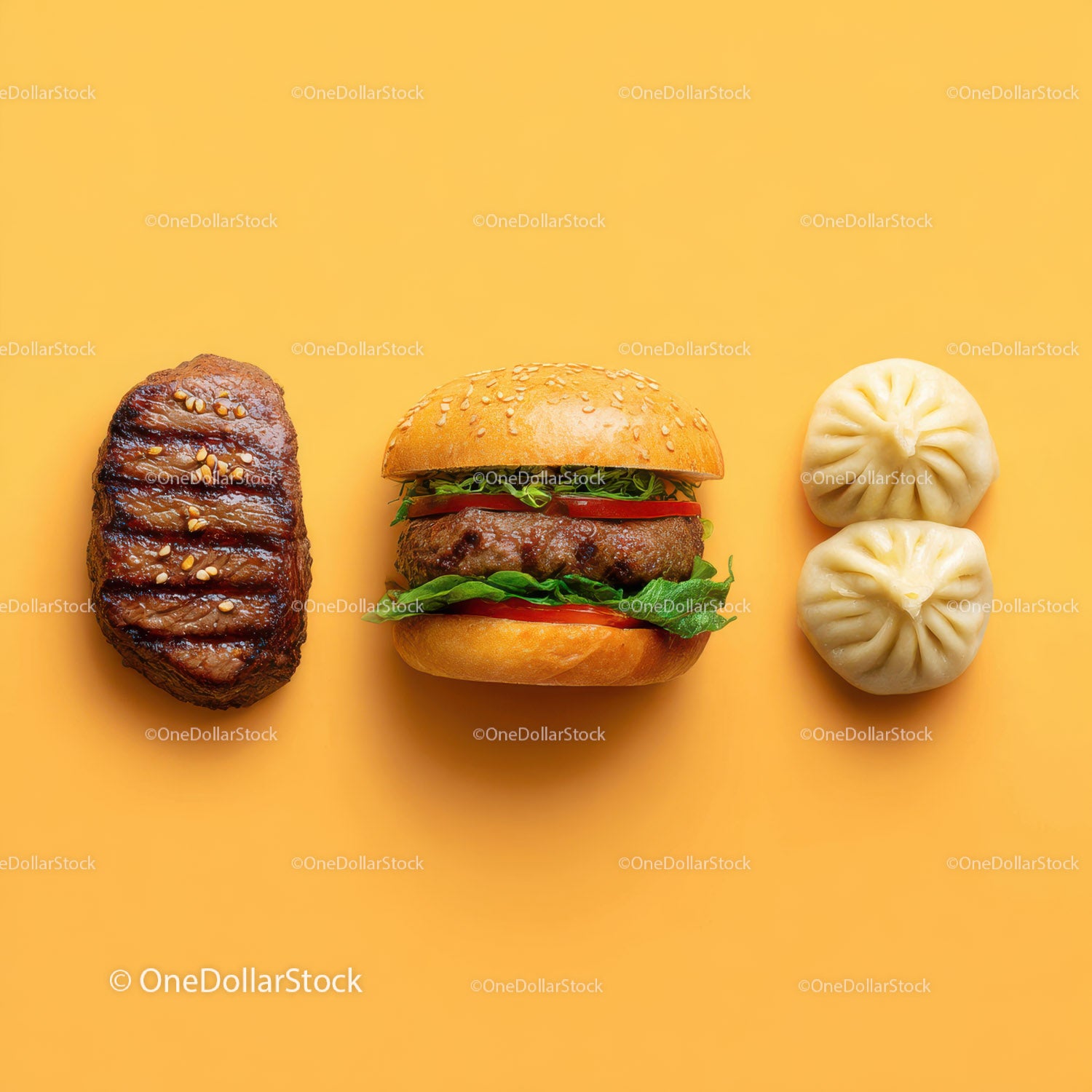 Gourmet Burger with Lettuce and Tomato Next to Grilled Steak and Dumpling