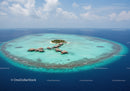 Overwater Bungalows and Turquoise Lagoon on Tropical Island Scene