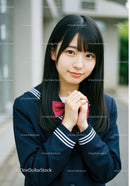 Smiling Japanese Schoolgirl in Navy School Uniform Outdoors