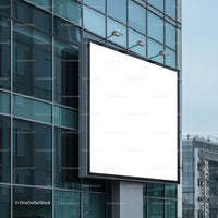 Blank Urban Billboard on Reflective Glass Building