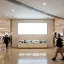 Luxury store display inside bright modern shopping mall