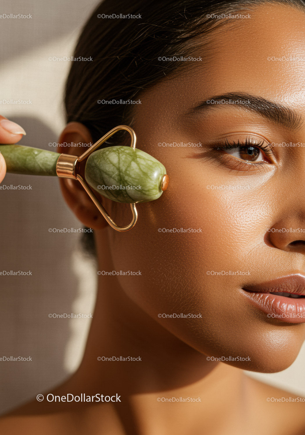 Woman Using Jade Roller for Facial Massage with Smooth Skin