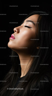 Young Woman in Profile with Eyes Closed and Serene Expression